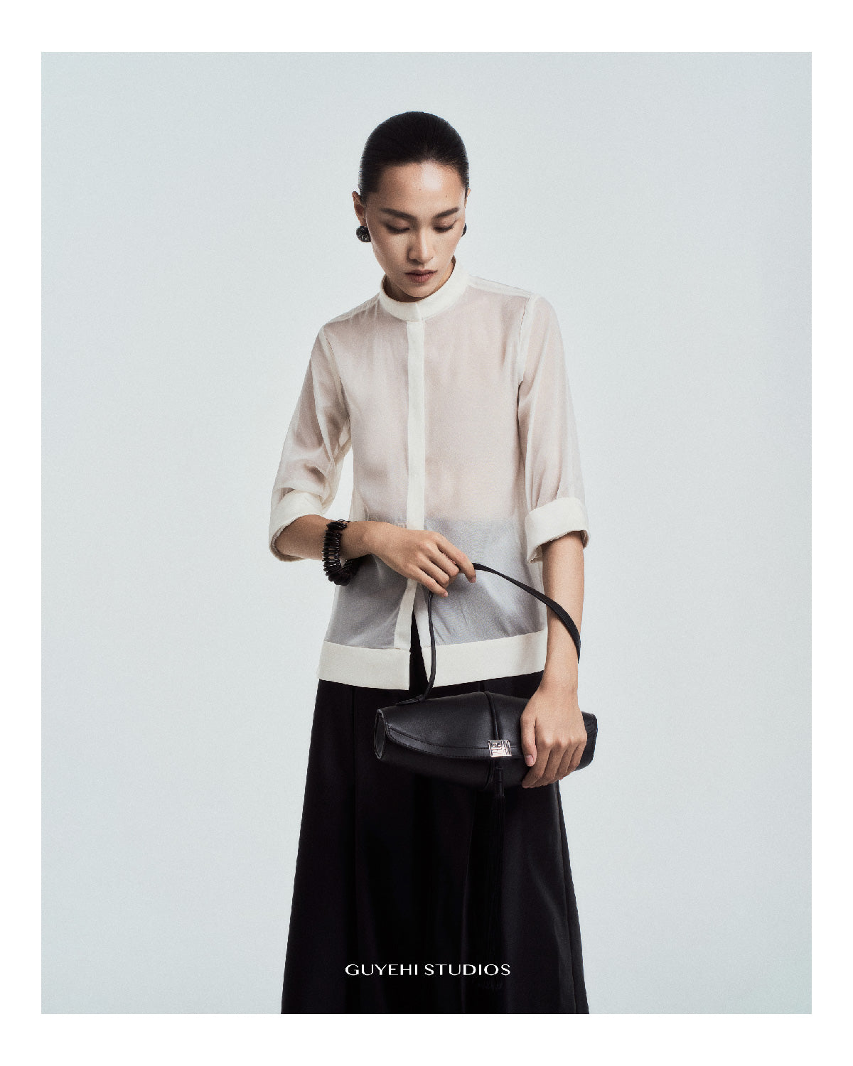 Scroll Tassel Bag in Leather - Ink