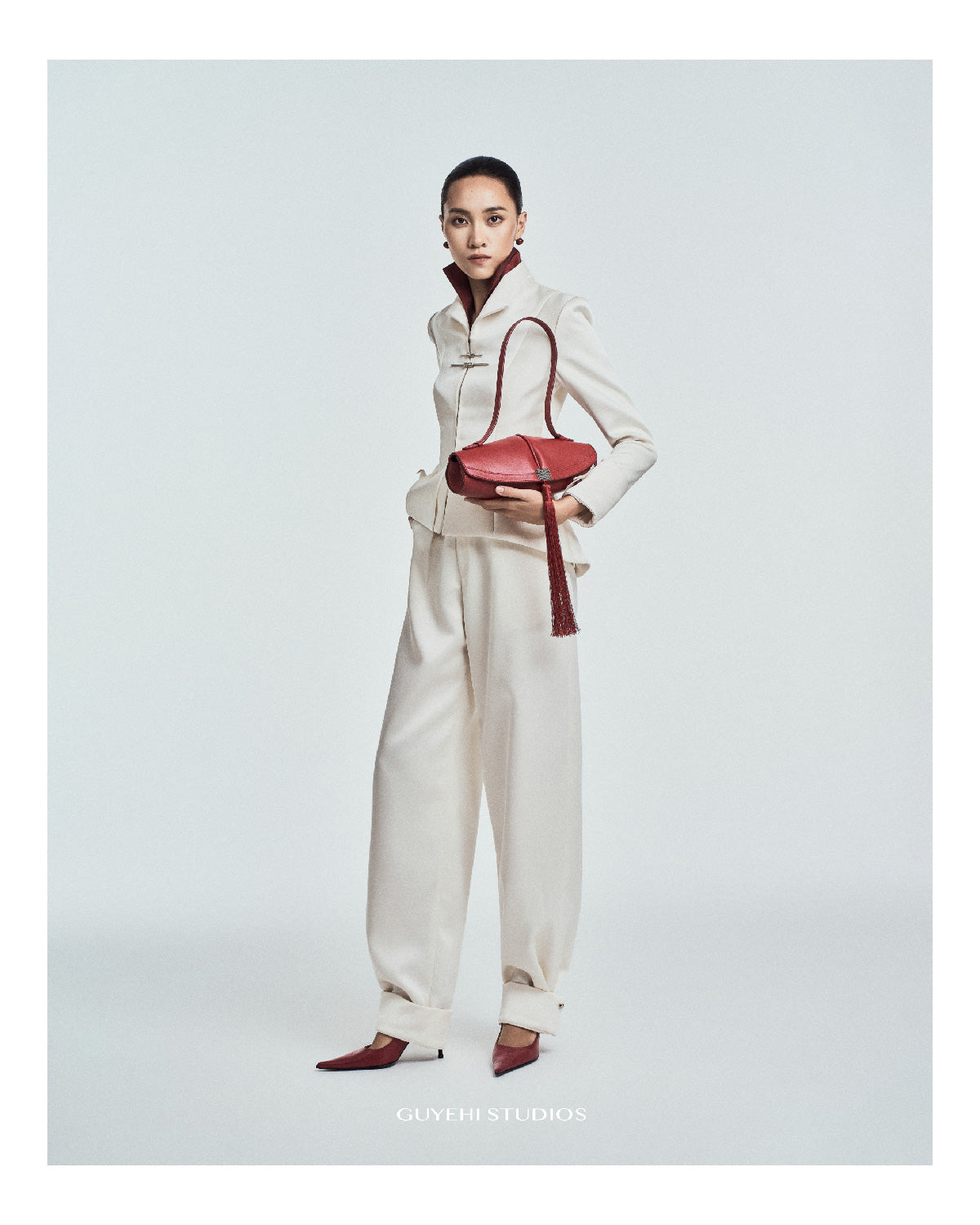 Scroll Tassel Bag in Leather - Cinnabar